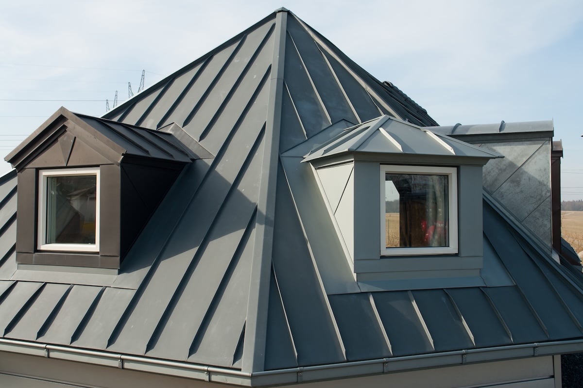 Modern design vertical roof window with black light metal covering