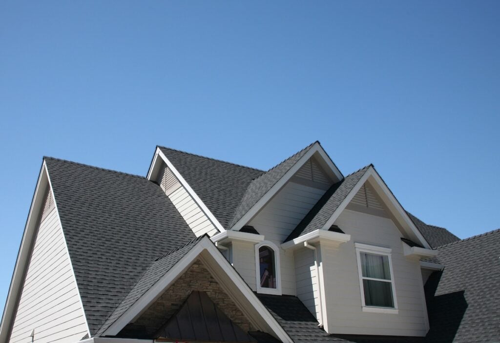 Modern House with Multiple Roof Lines and Asphalt Shingles
