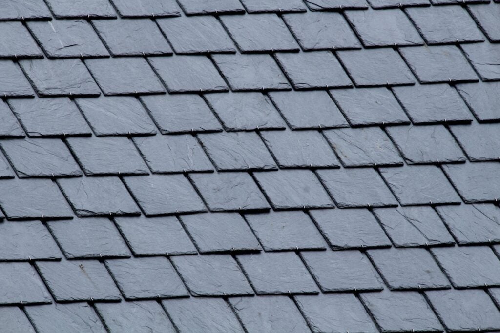 New slate roof, slate texture, perfect shape. Slating roof. Grey colors.