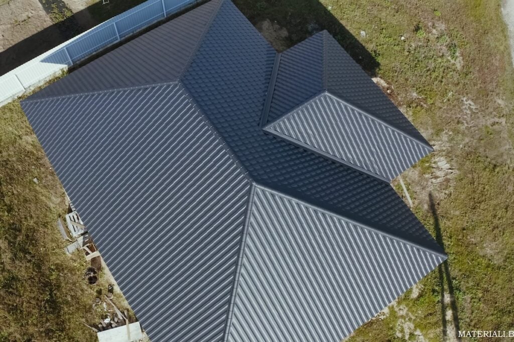 Modern roof made of metal. Corrugated metal roof and metal roofing.