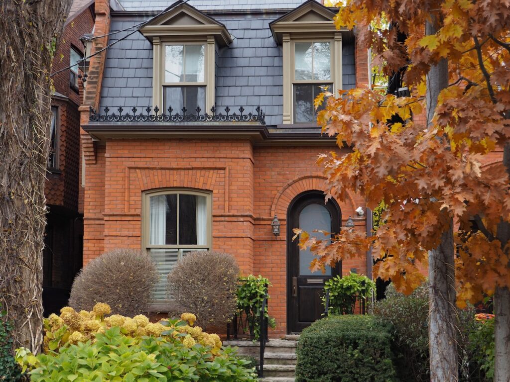 old brick house with slate mansard roof