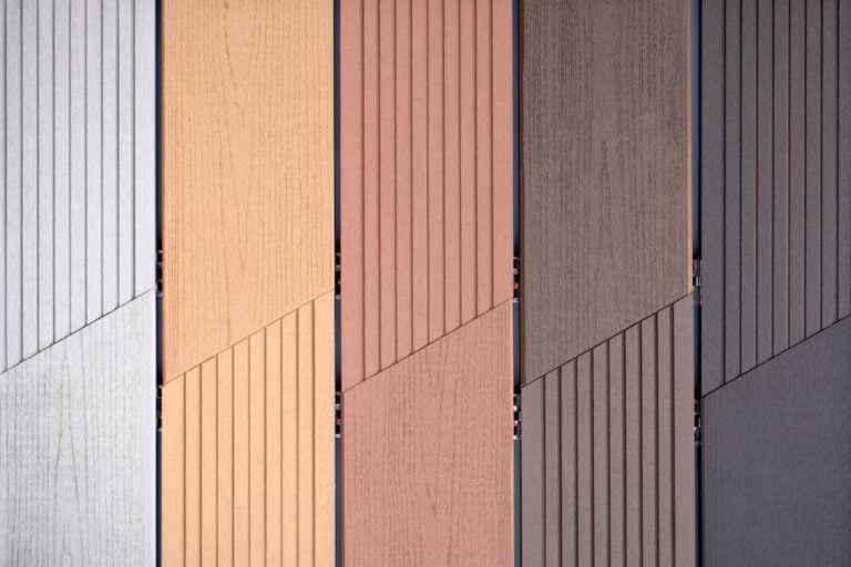 Samples of plastic siding with different colors, texture.