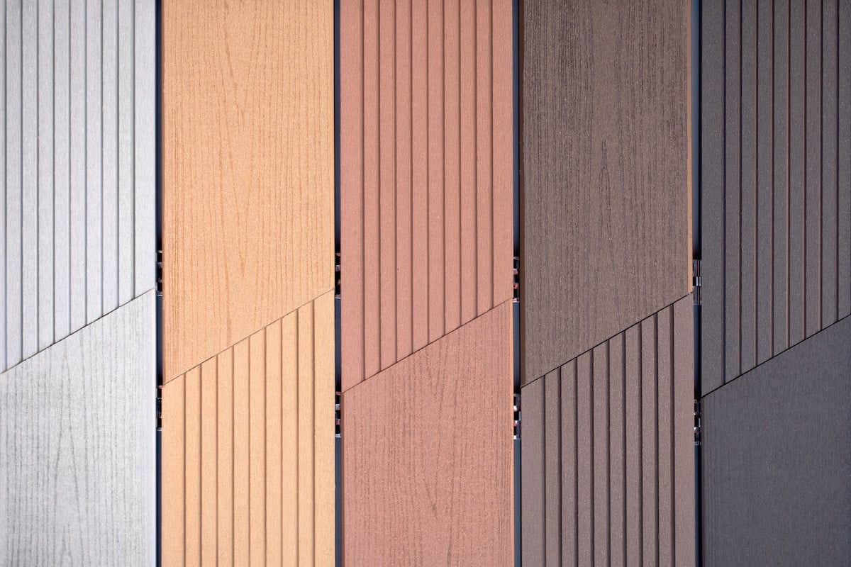 Samples of plastic siding with different colors, texture.
