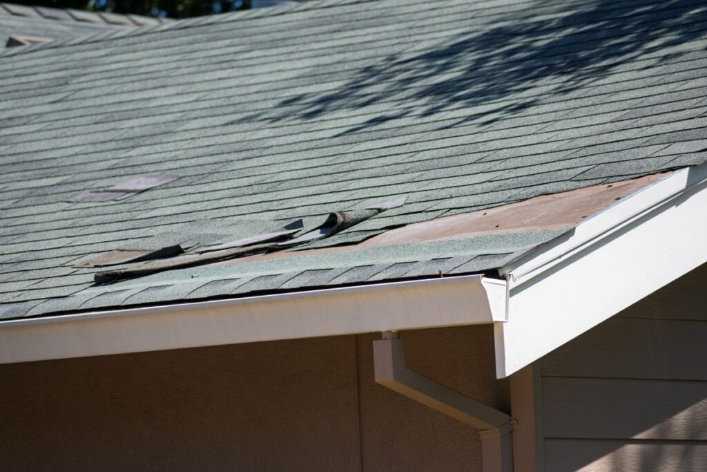 roof with missing and broken shingles