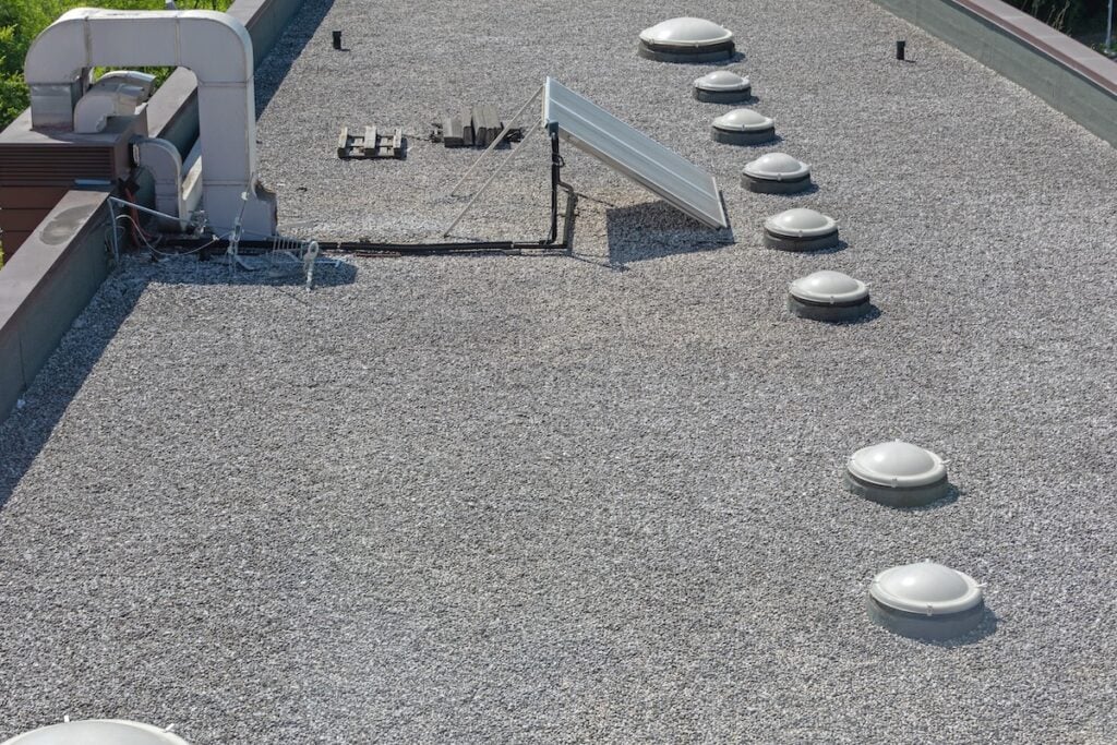 Solar Cells and Skylight Windows at Gravel Flat Roof