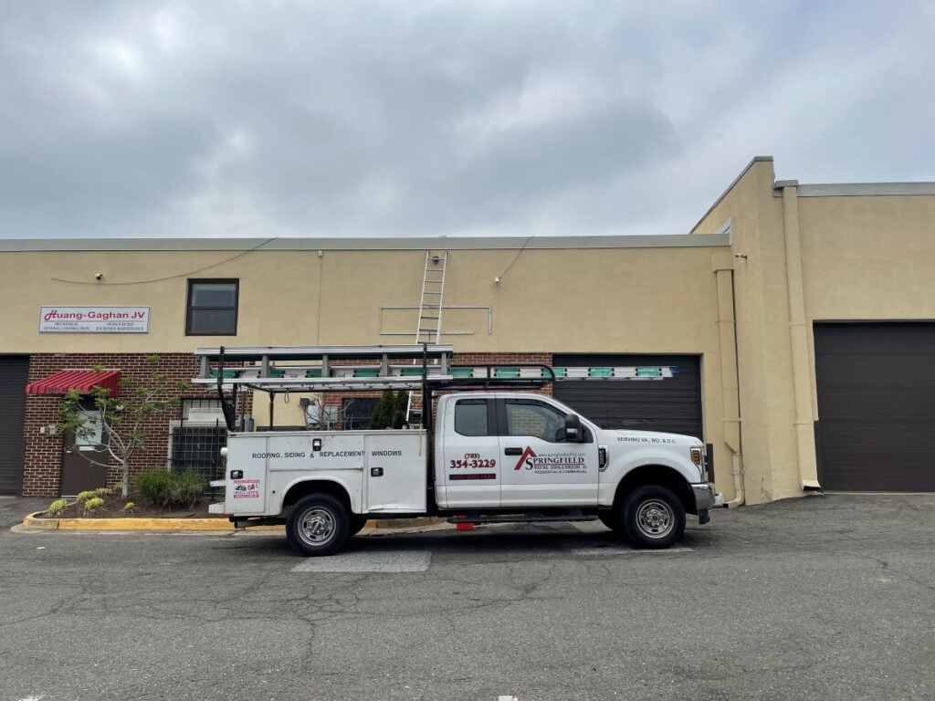 certified roofing contractor Springfield Roofing branded truck parked outside
