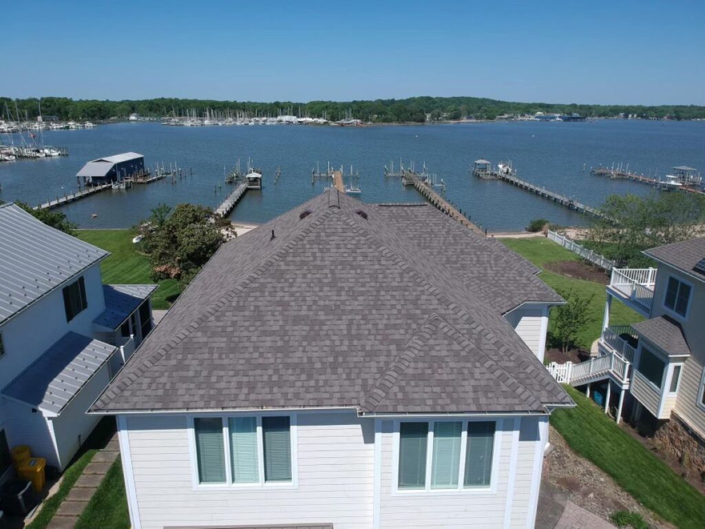 how long do roofs last Springfield Roofing grey shingles roof aerial view