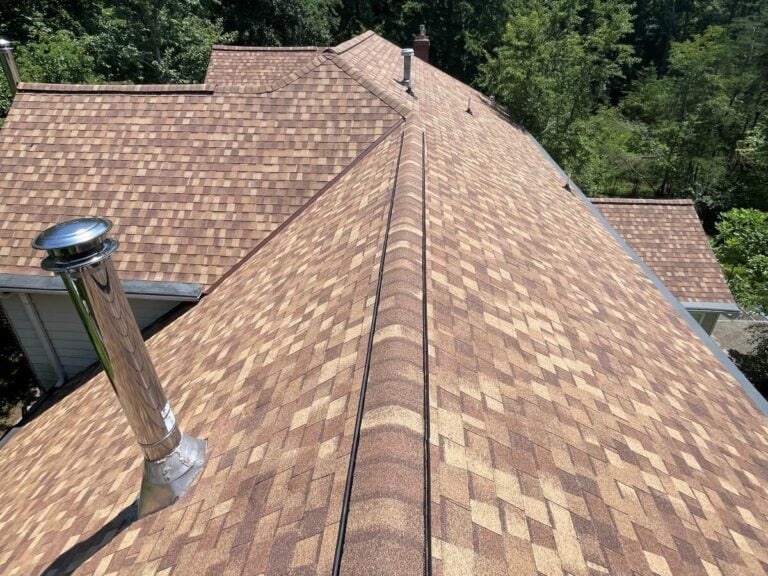 how long do roofs last Springfield Roofing project brown shingles roof house