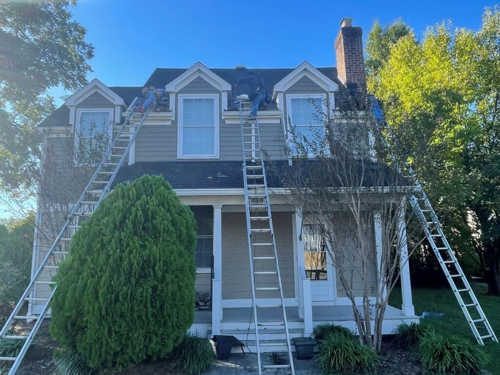 trusted roofing company Springfield Roofing project workers replacing roof