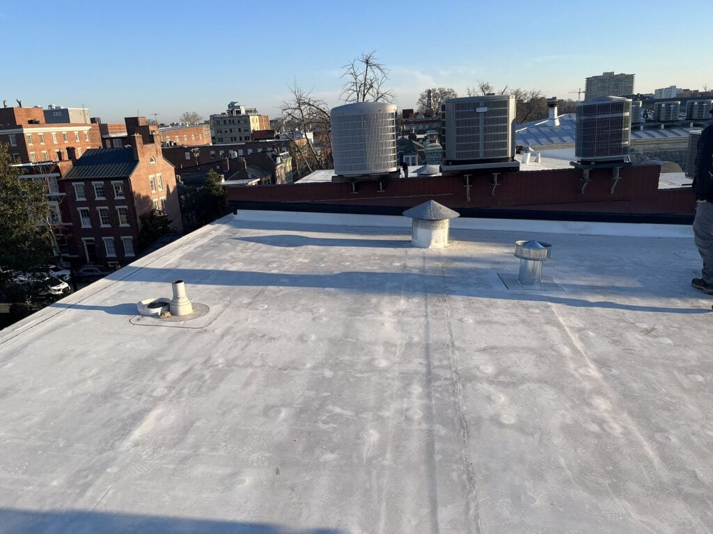 commercial roofing maintenance flat grey roof asphalt roof
