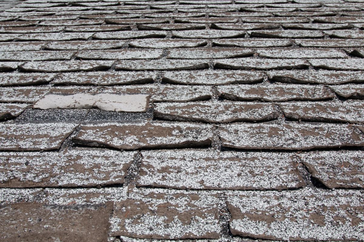 asphalt roof repair old shingles curling and falling apart