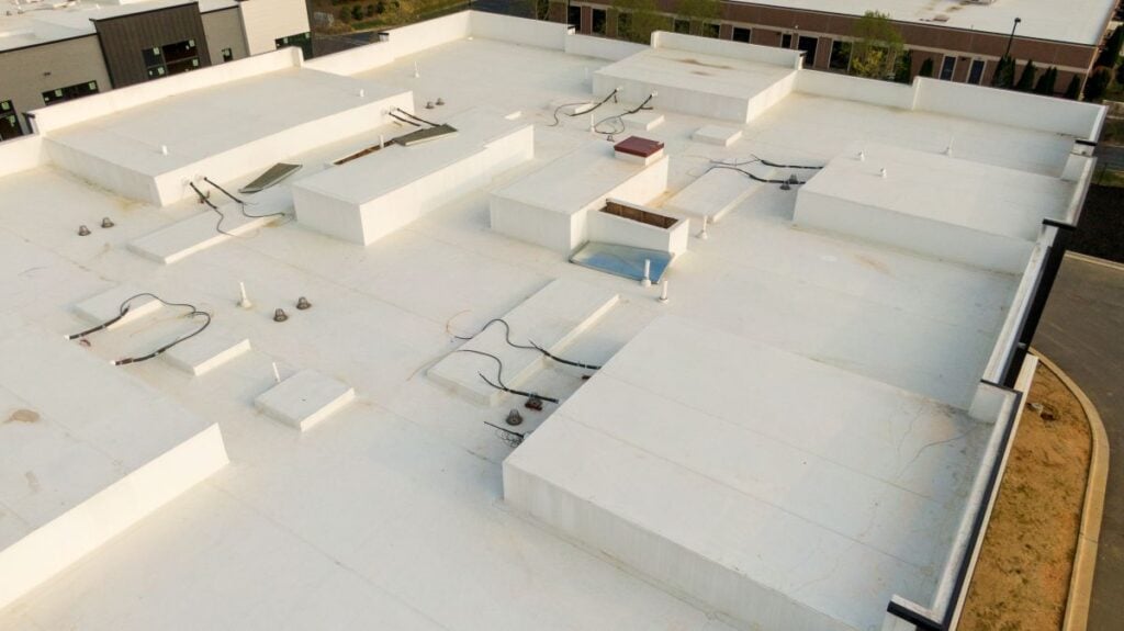 roofing maintenance programs TPO white roof aerial view