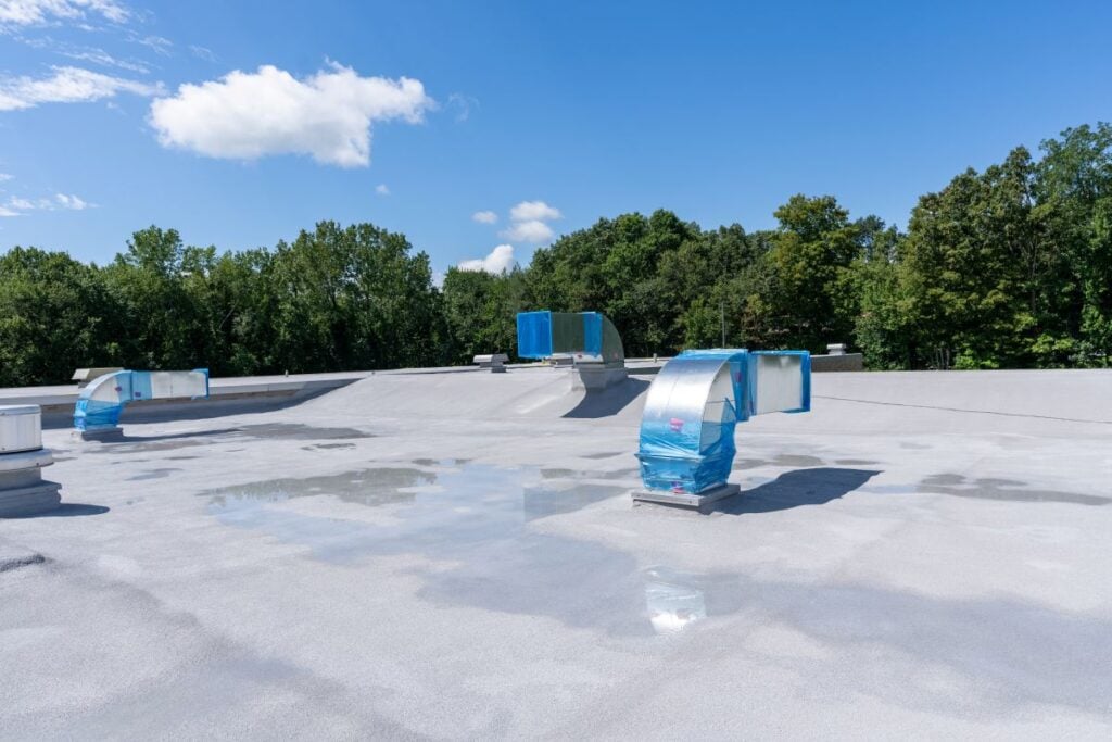 Construction of new roof mounted HVAC Ductwork waiting for new Roof Top Units